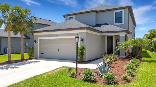 8355 Velda Trl, Sarasota, FL 34241 - view of front facade with an attached garage, stucco siding, roof with shingles, driveway, and a front lawn