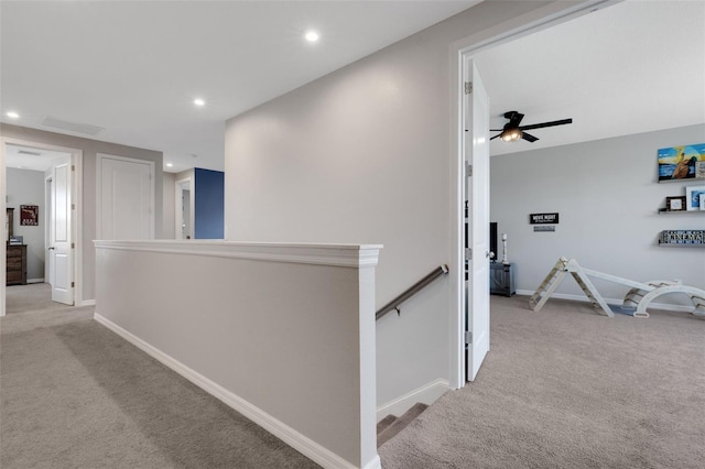 8355 Velda Trl, Sarasota, FL 34241 - hall featuring an upstairs landing, light carpet, and recessed lighting