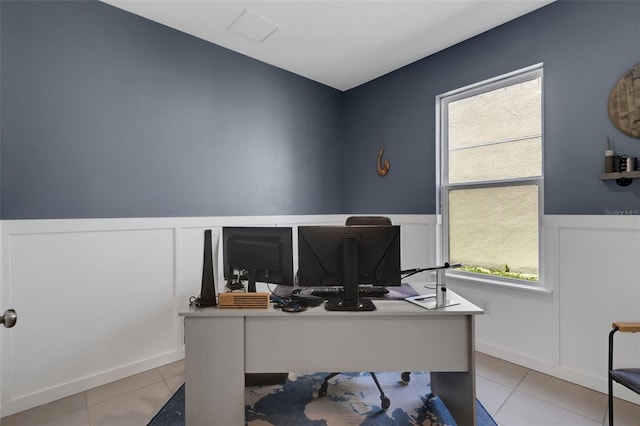 8355 Velda Trl, Sarasota, FL 34241 - home office with a wainscoted wall, light tile patterned floors, a decorative wall, and healthy amount of natural light