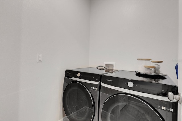 8355 Velda Trl, Sarasota, FL 34241 - laundry room featuring separate washer and dryer