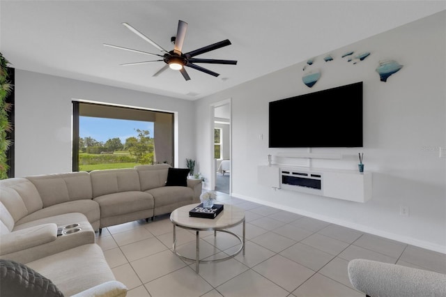 8355 Velda Trl, Sarasota, FL 34241 - living area featuring a ceiling fan and light tile patterned flooring