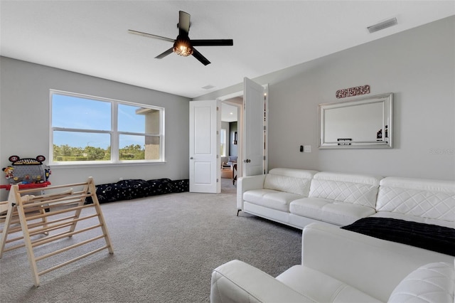 8355 Velda Trl, Sarasota, FL 34241 - carpeted living area featuring a ceiling fan