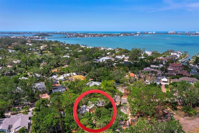 bird's eye view with a water view and a residential view