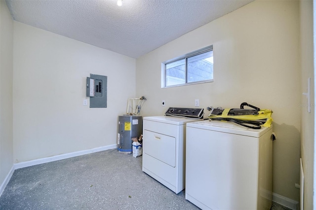 laundry room with electric panel, laundry area, a textured ceiling, electric water heater, and washing machine and dryer