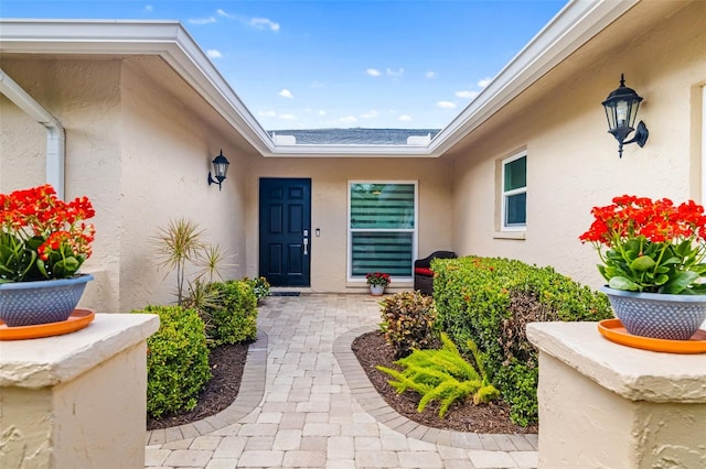 6940 W Country Club Dr N Unit V-77, Sarasota, FL 34243 - entrance to property featuring stucco siding