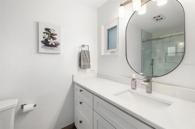 6940 W Country Club Dr N Unit V-77, Sarasota, FL 34243 - bathroom featuring toilet, a stall shower, and vanity