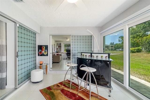 6940 W Country Club Dr N Unit V-77, Sarasota, FL 34243 - sunroom featuring plenty of natural light