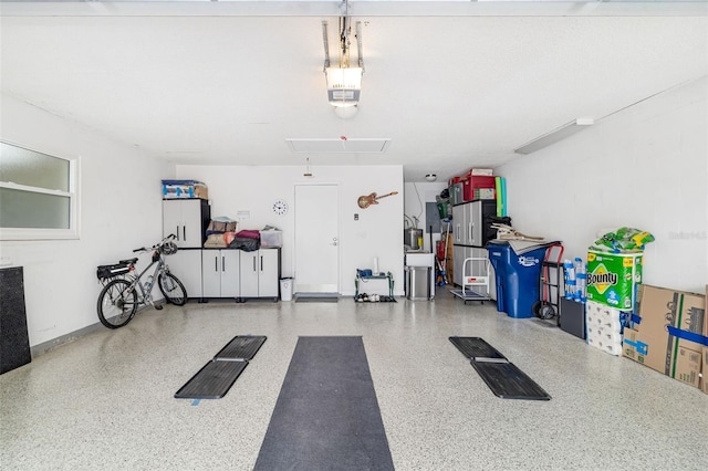 6940 W Country Club Dr N Unit V-77, Sarasota, FL 34243 - garage with a garage door opener