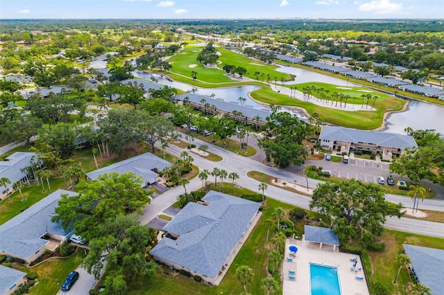 6940 W Country Club Dr N Unit V-77, Sarasota, FL 34243 - bird's eye view featuring a water view, view of golf course, and a residential view