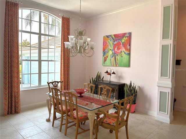 dining space with light tile patterned floors, a chandelier, baseboards, and ornamental molding