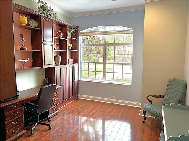 office space featuring baseboards, ornamental molding, and dark wood-style floors
