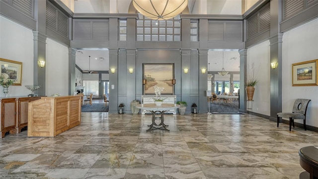 lobby featuring a towering ceiling