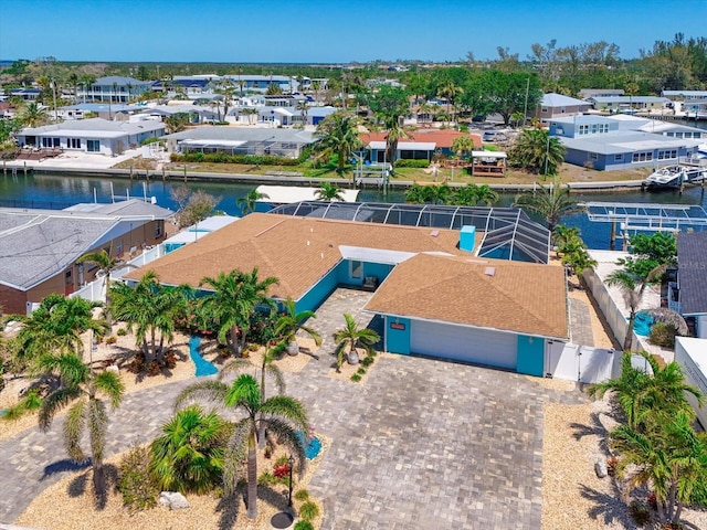 10016 Spoonbill Rd E, Bradenton, FL 34209 - birds eye view of property featuring a water view and a residential view