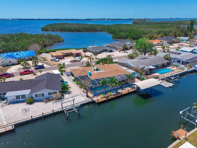 10016 Spoonbill Rd E, Bradenton, FL 34209 - bird's eye view with a water view and a residential view