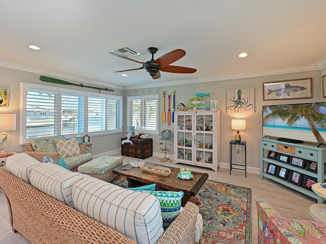 10016 Spoonbill Rd E, Bradenton, FL 34209 - living room with crown molding, a ceiling fan, visible vents, recessed lighting, and baseboards