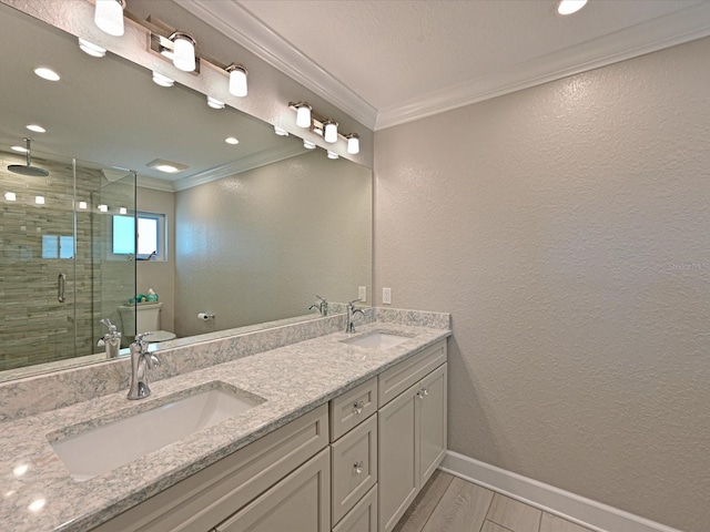10016 Spoonbill Rd E, Bradenton, FL 34209 - full bath with toilet, a stall shower, a sink, and ornamental molding