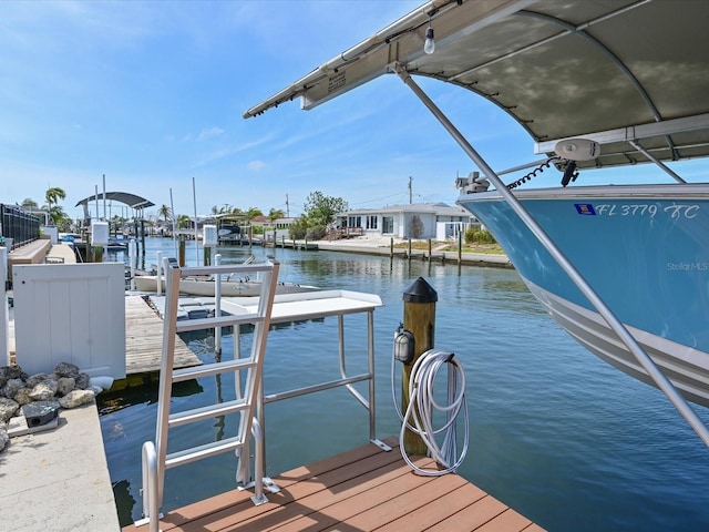 10016 Spoonbill Rd E, Bradenton, FL 34209 - view of dock featuring a water view