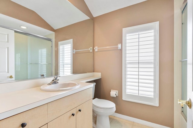 full bath featuring tile patterned flooring, a shower with shower door, vanity, toilet, and baseboards