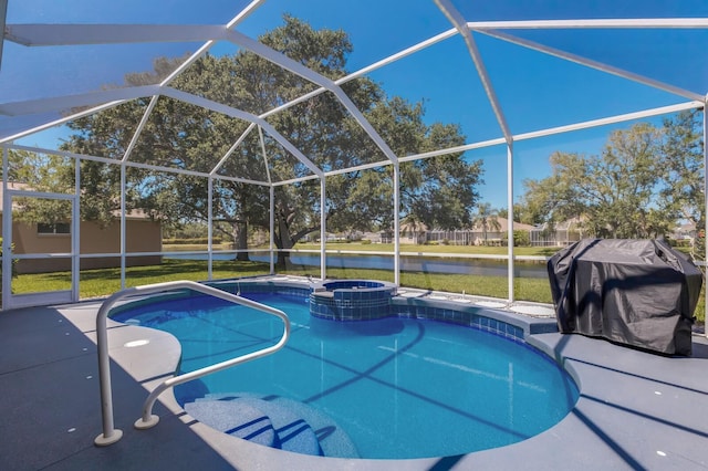 view of swimming pool featuring a lawn, glass enclosure, a patio area, and a grill