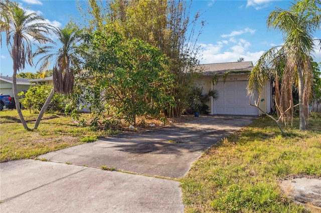 view of front of home with an attached garage and driveway