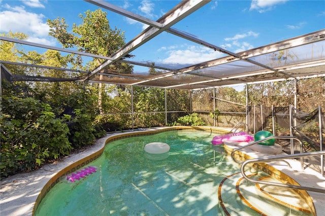 outdoor pool featuring a lanai