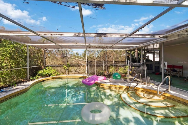 outdoor pool featuring glass enclosure
