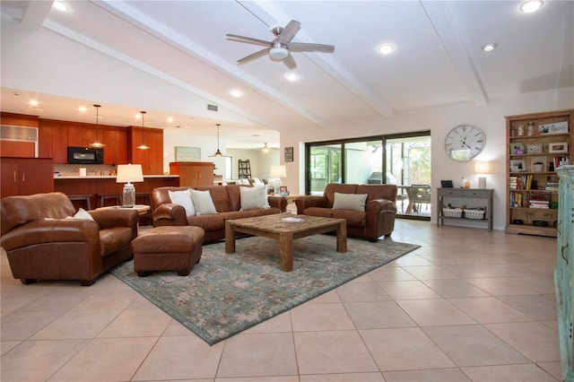 living area with ceiling fan, light tile patterned flooring, and recessed lighting