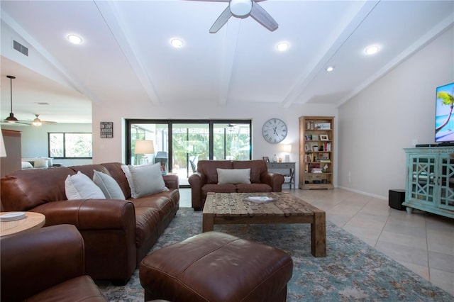 living area featuring a ceiling fan, healthy amount of natural light, light tile patterned flooring, recessed lighting, and baseboards