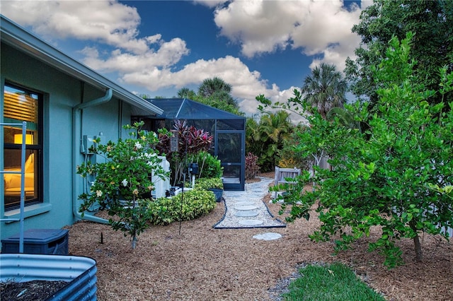 view of yard with a lanai