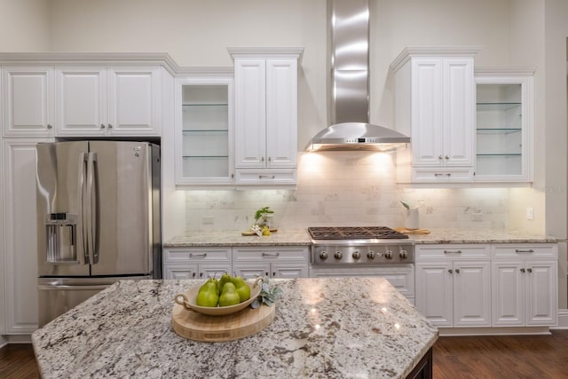 7532 Greystone St, Lakewood Ranch, FL 34202 - kitchen with stainless steel appliances, wall chimney range hood, and white cabinetry