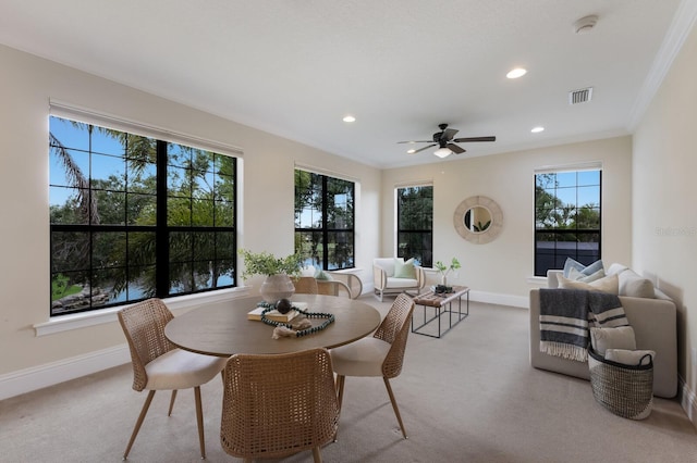 7532 Greystone St, Lakewood Ranch, FL 34202 - carpeted dining area with baseboards, recessed lighting, ceiling fan, and ornamental molding