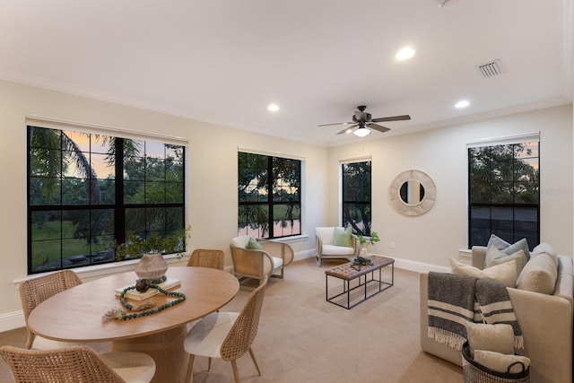 7532 Greystone St, Lakewood Ranch, FL 34202 - dining room with a ceiling fan, recessed lighting, ornamental molding, baseboards, and light colored carpet
