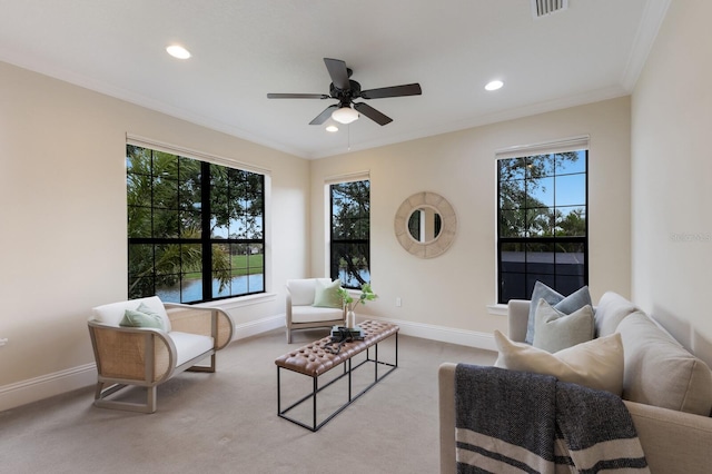 7532 Greystone St, Lakewood Ranch, FL 34202 - living area featuring plenty of natural light, ceiling fan, recessed lighting, baseboards, and crown molding