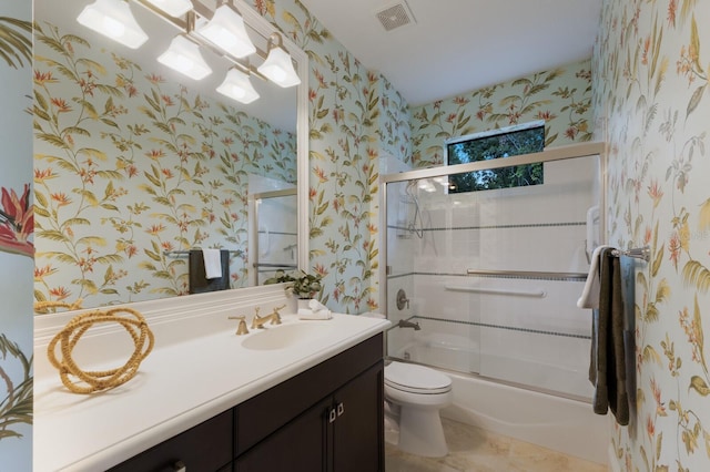 7532 Greystone St, Lakewood Ranch, FL 34202 - full bath with wallpapered walls, toilet, vanity, and shower / bath combination with glass door
