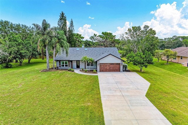 1103 134th St E, Bradenton, FL 34212 - ranch-style home featuring a garage, driveway, a front lawn, and covered porch