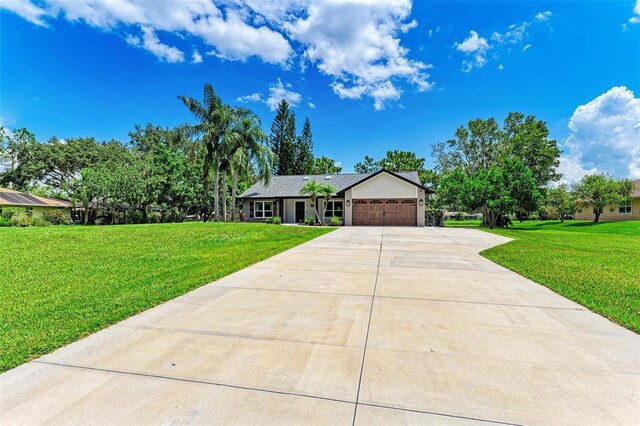 1103 134th St E, Bradenton, FL 34212 - ranch-style home featuring a garage, a front lawn, and driveway