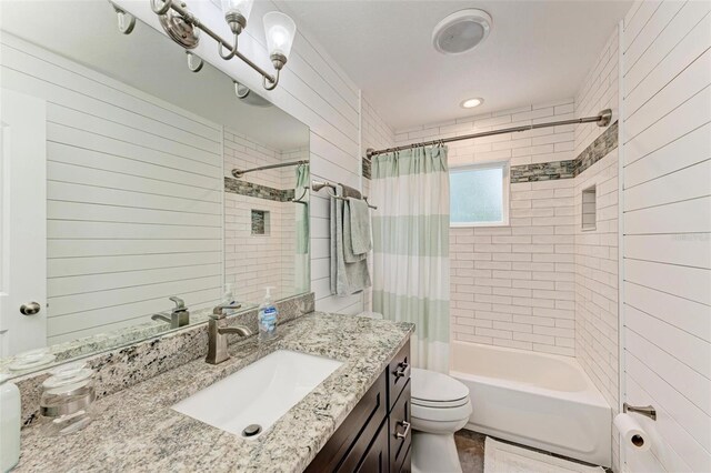 1103 134th St E, Bradenton, FL 34212 - full bathroom with toilet, shower / tub combo with curtain, and vanity