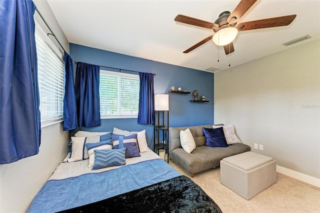 1103 134th St E, Bradenton, FL 34212 - carpeted bedroom featuring a ceiling fan and baseboards