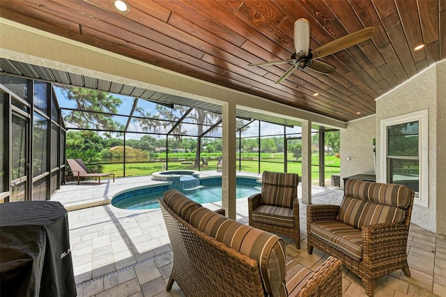 1103 134th St E, Bradenton, FL 34212 - view of patio / terrace featuring a lanai, ceiling fan, a pool with connected hot tub, and an outdoor hangout area