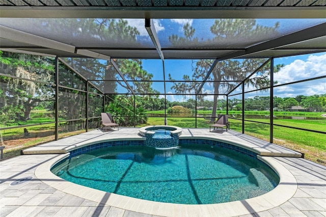 1103 134th St E, Bradenton, FL 34212 - view of swimming pool featuring a patio, glass enclosure, a pool with connected hot tub, and a lawn