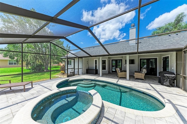 1103 134th St E, Bradenton, FL 34212 - view of swimming pool featuring a patio area, french doors, a pool with connected hot tub, and an outdoor living space