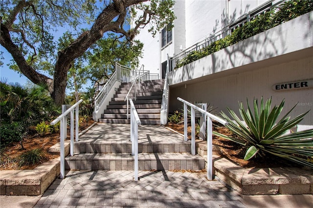view of community with stairs