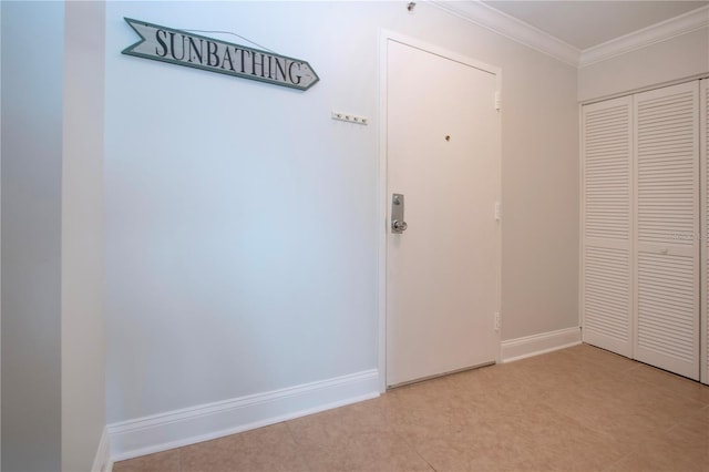 corridor with crown molding and baseboards