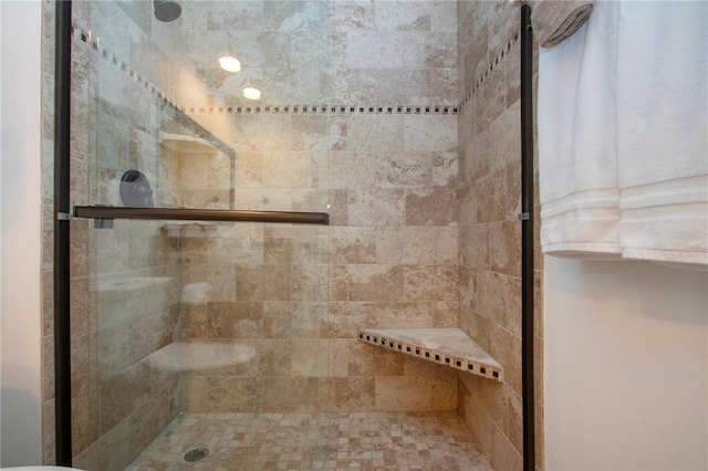 bathroom featuring a stall shower