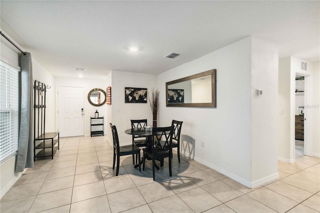 2812 Rock Sound St, Bradenton, FL 34208 - dining area with light tile patterned floors and baseboards