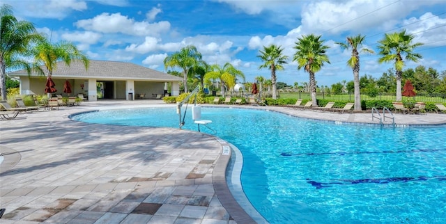 4010 Lindever Ln, Palmetto, FL 34221 - community pool featuring a patio area
