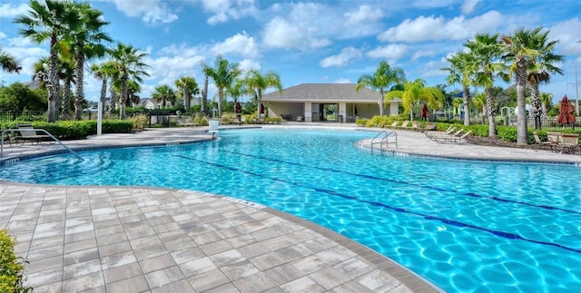 4010 Lindever Ln, Palmetto, FL 34221 - community pool featuring a patio area