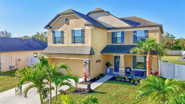 4010 Lindever Ln, Palmetto, FL 34221 - view of front of home featuring stucco siding, an attached garage, driveway, and roof with shingles