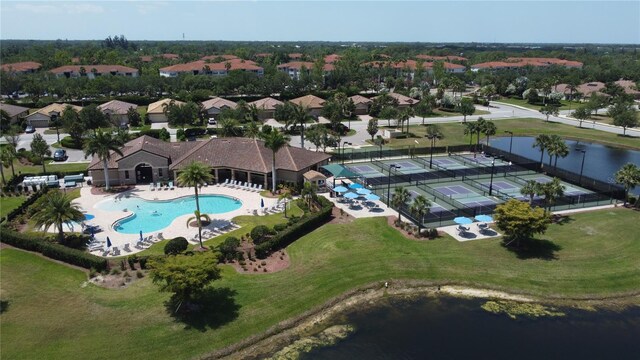 aerial view featuring a water view and a residential view