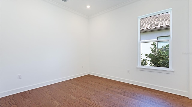 15722 San Lazzaro Ave, Lakewood Ranch, FL 34211 - spare room featuring dark wood-style flooring, baseboards, ornamental molding, and recessed lighting